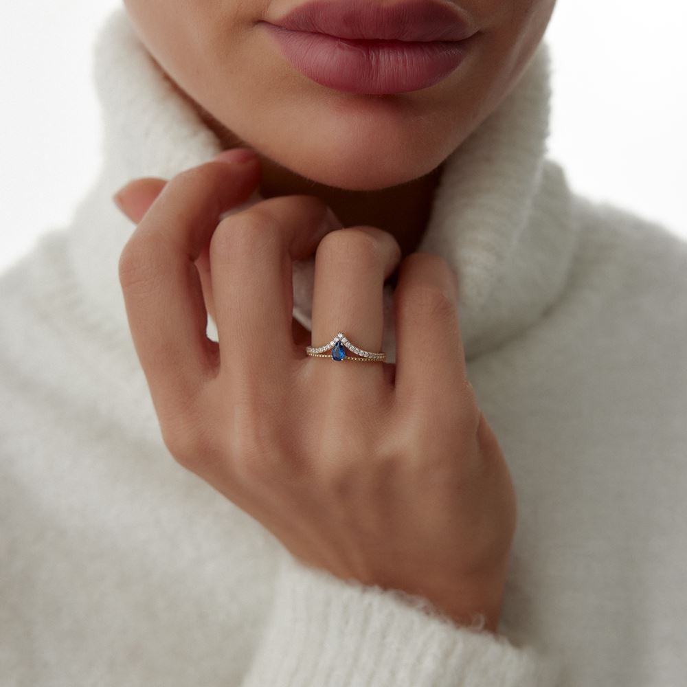 Beyaz Baget Damla Mavi Taşlı Yüzük