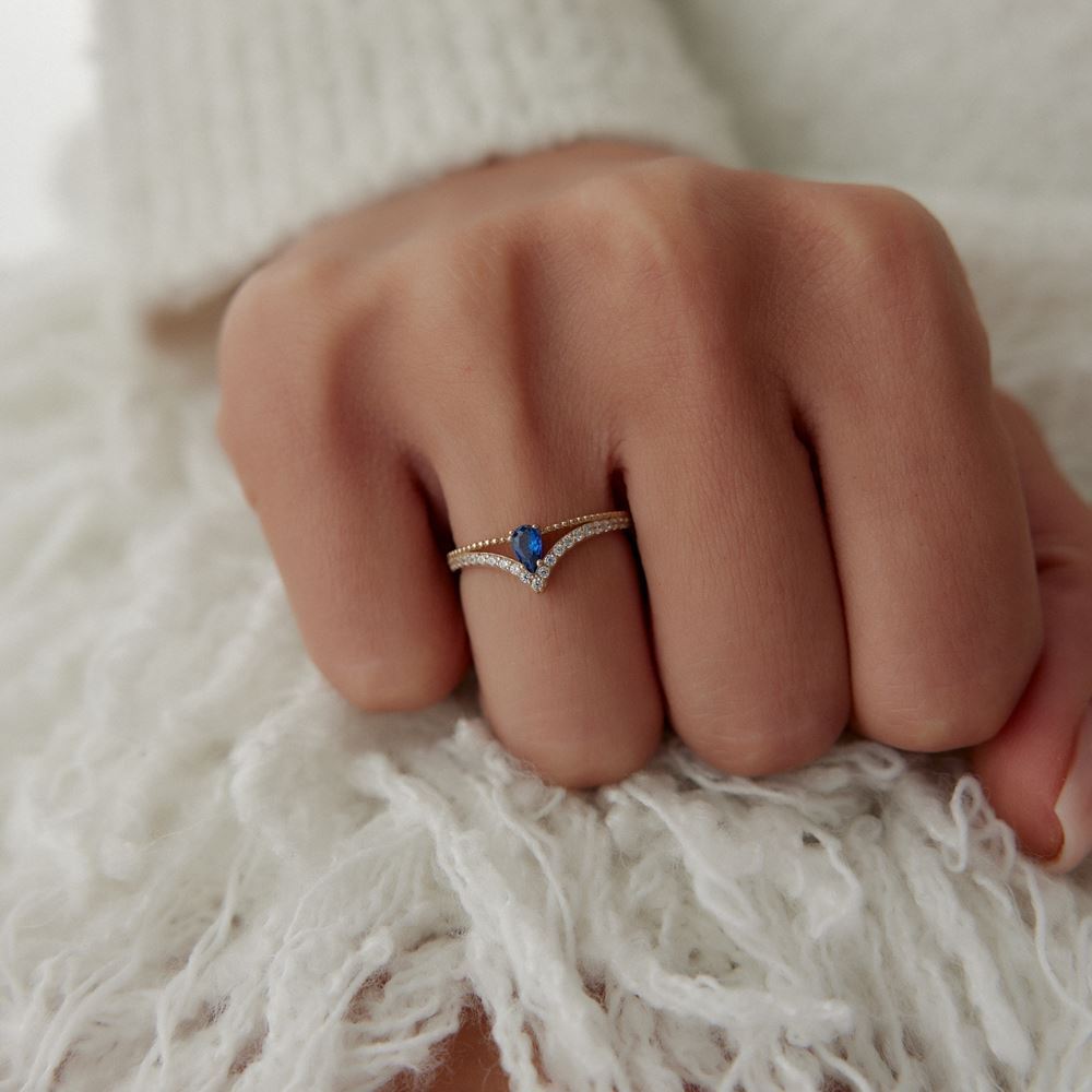 Beyaz Baget Damla Mavi Taşlı Yüzük